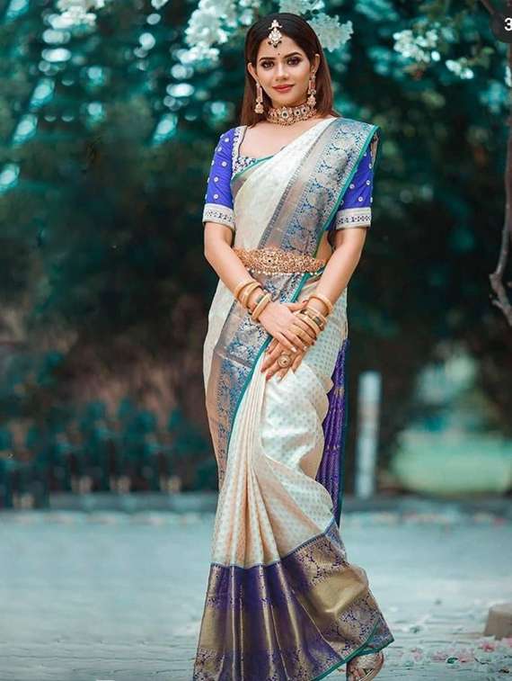women self design banarasi saree with blouse