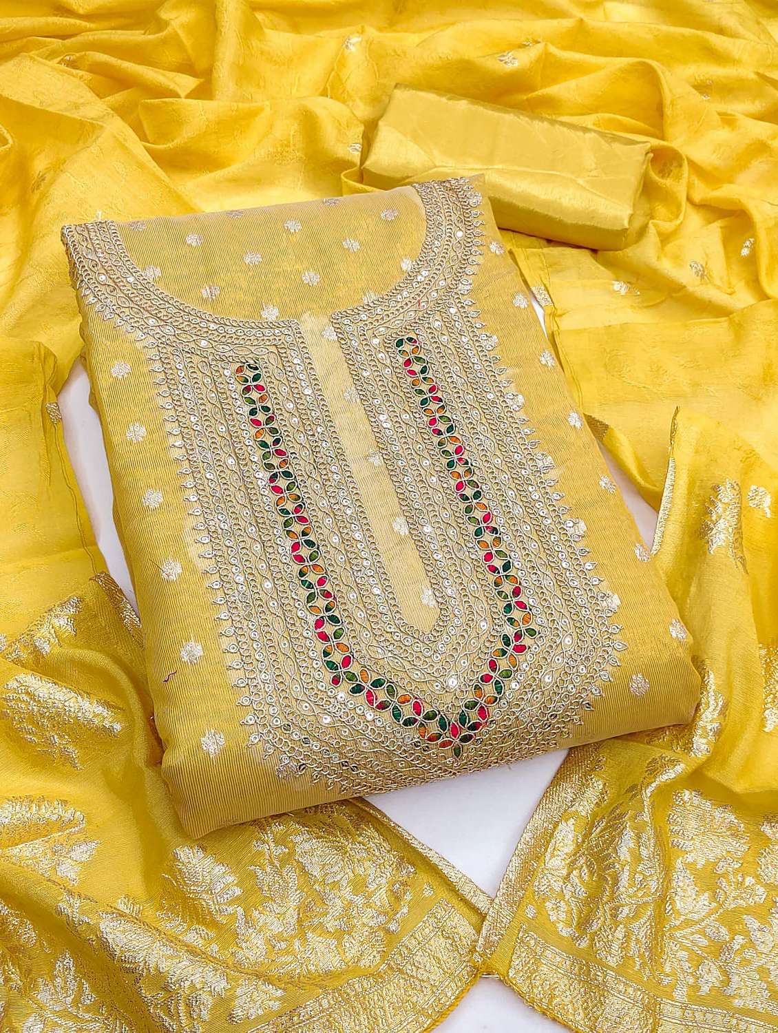 women self design embroidered unstitched suit set