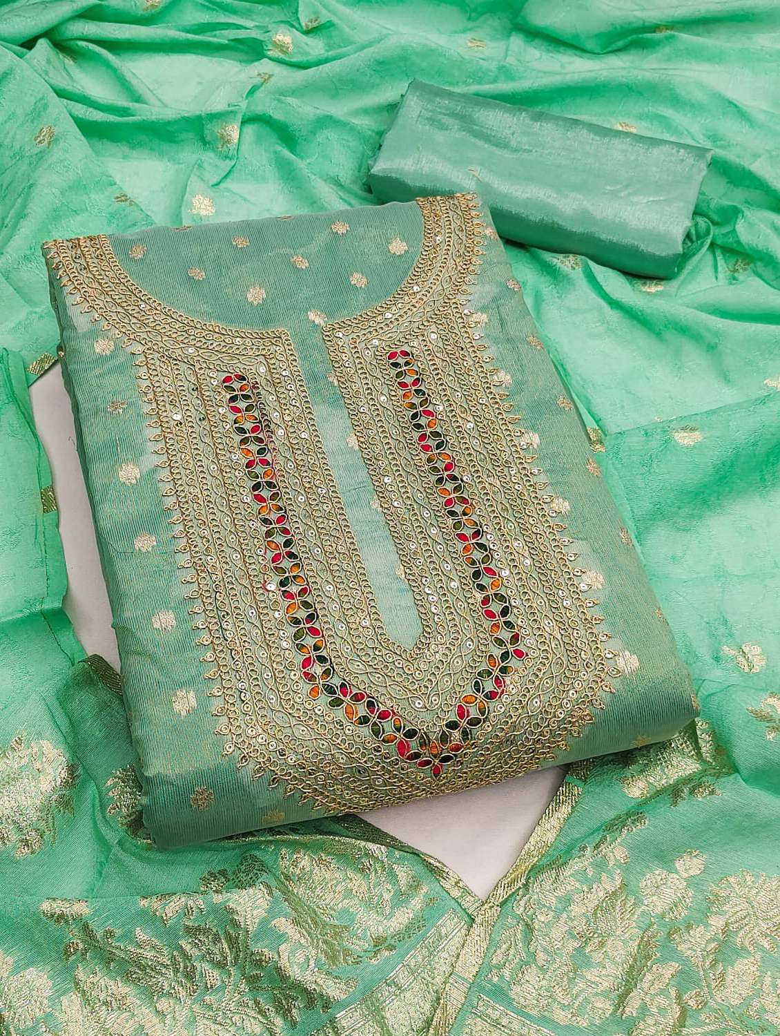 women self design embroidered unstitched suit set