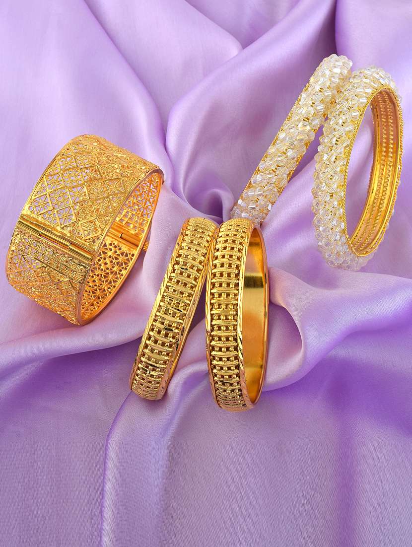women pack of 3 gold brass bangles