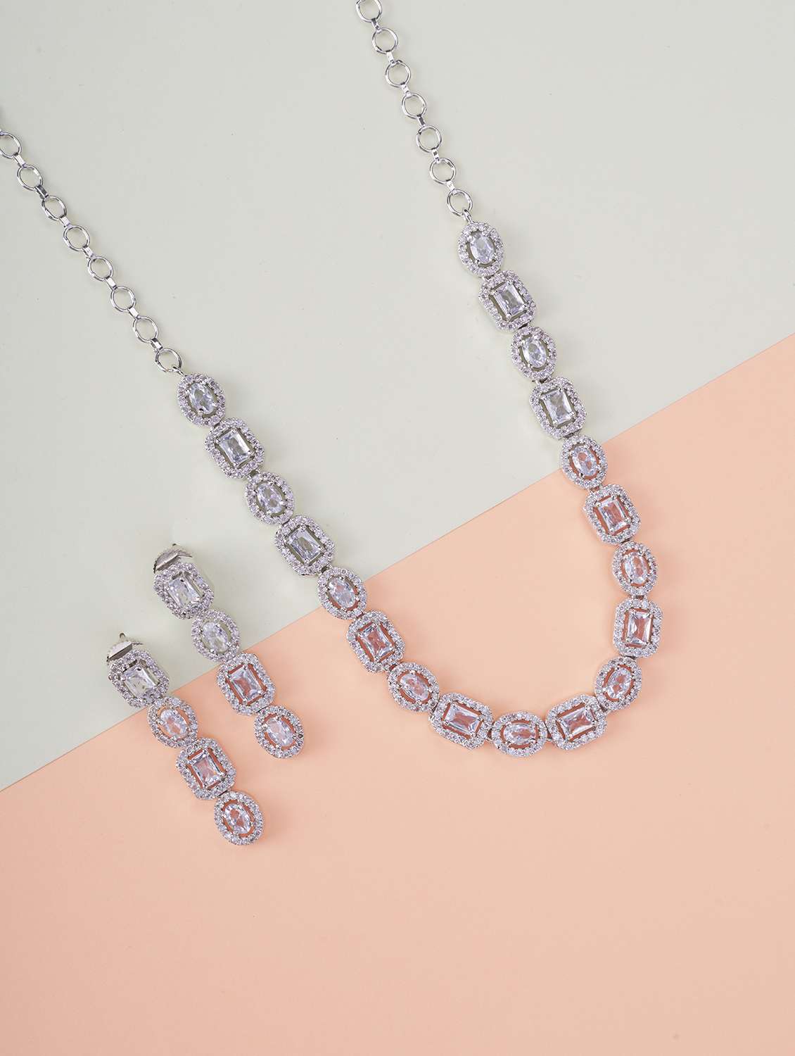 women stone studded necklace and earring set