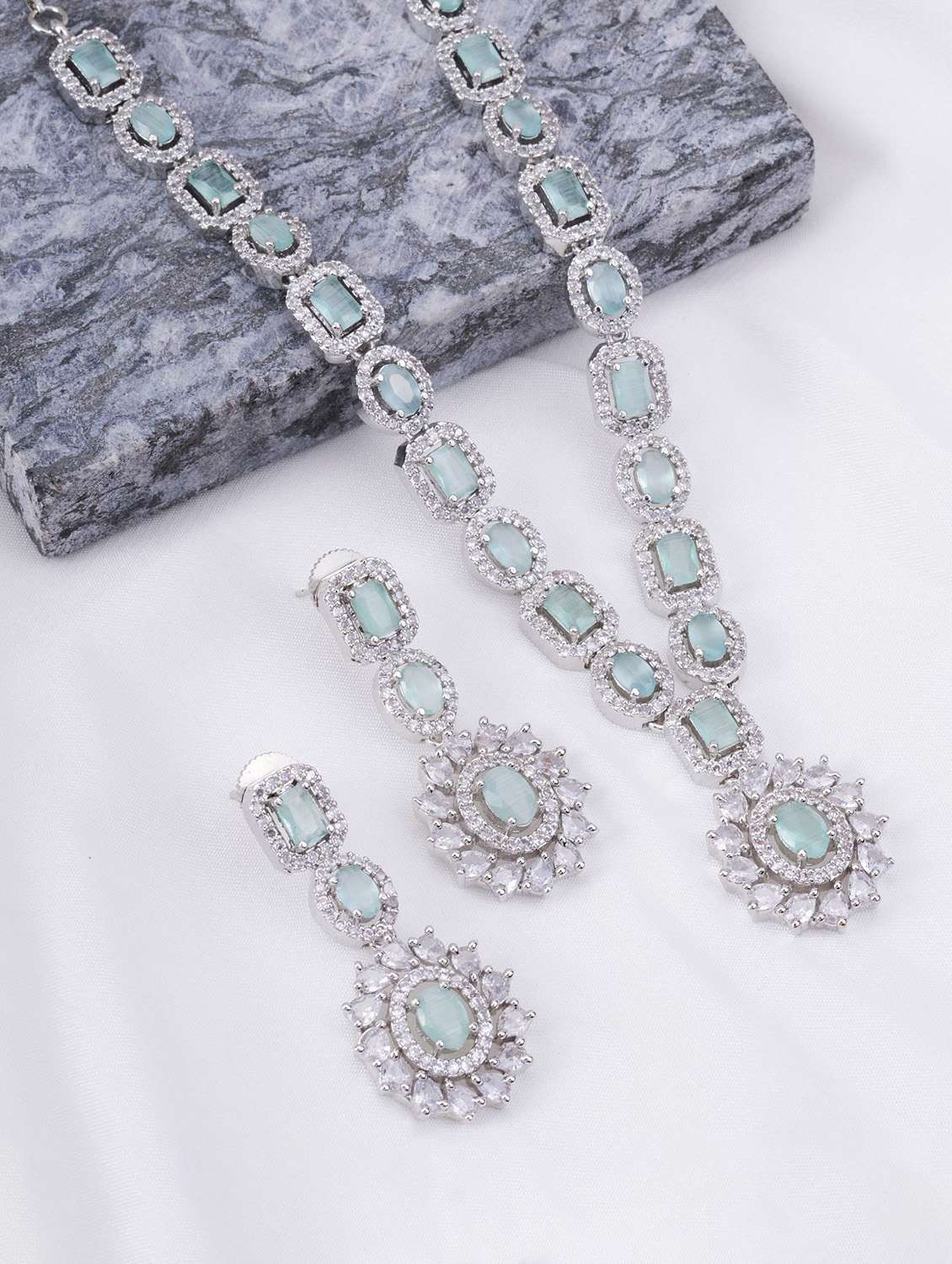 women stone studded necklace and earring set