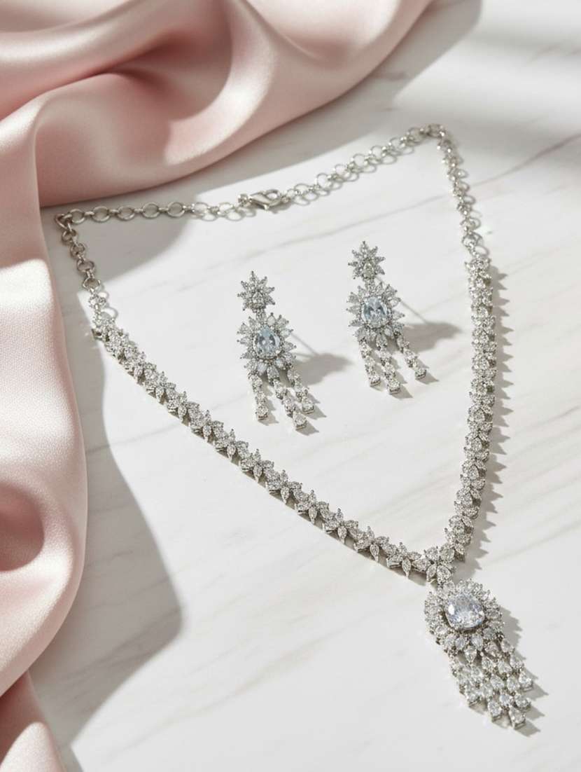 women stone studded necklace and earring set