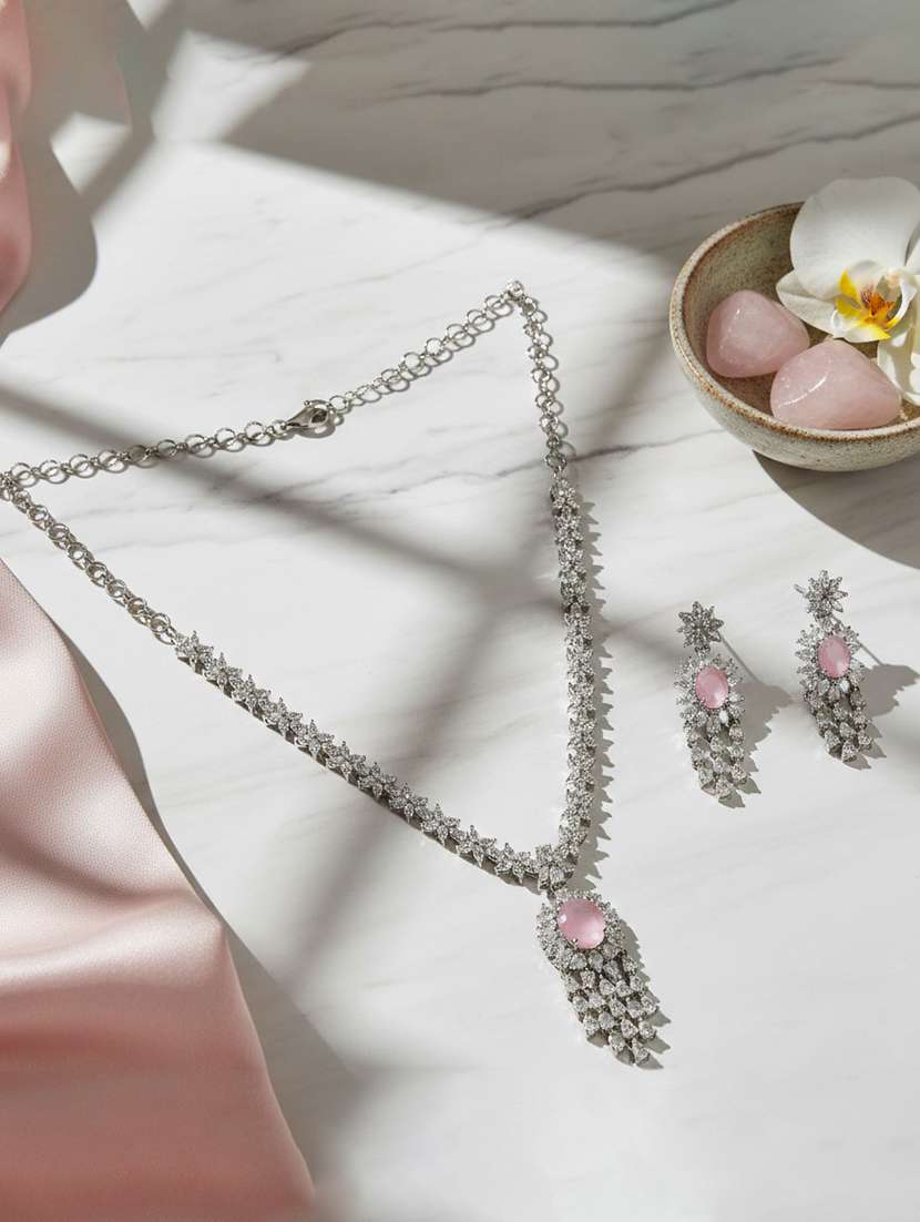 women stone studded necklace and earring set