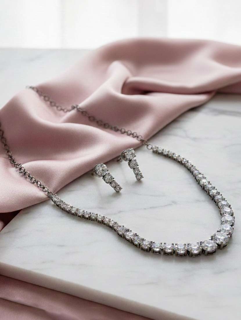 women stone studded necklace and earring set