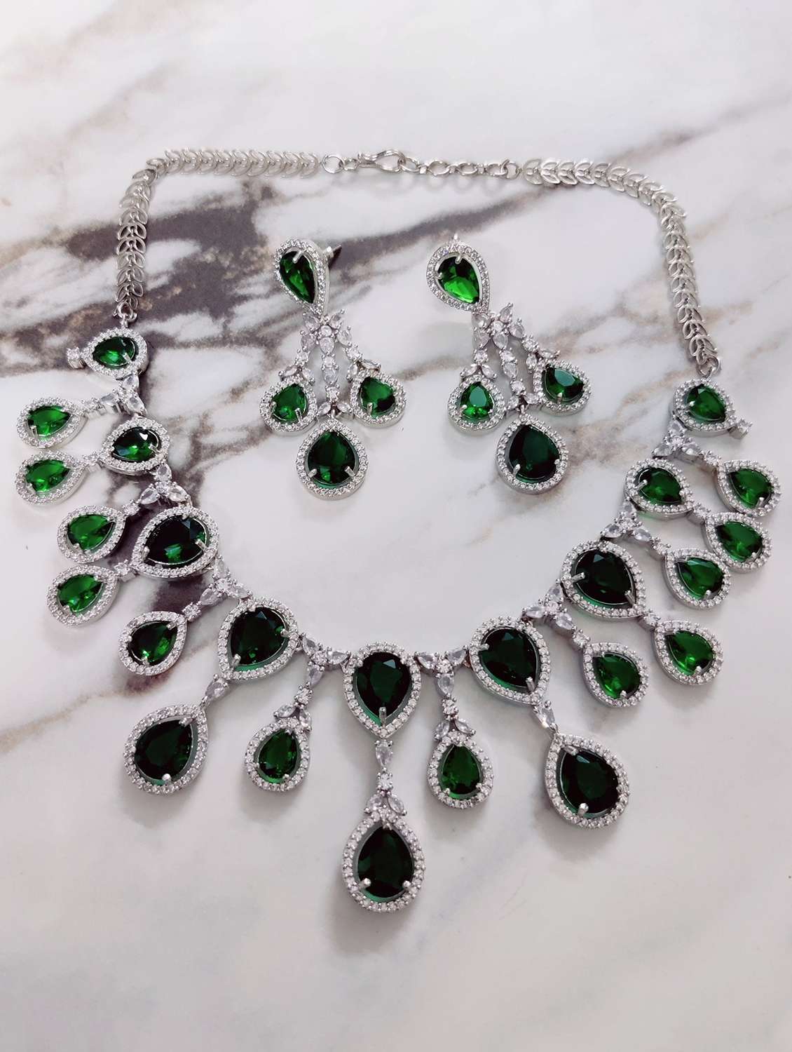 women stone studded necklace and earring set