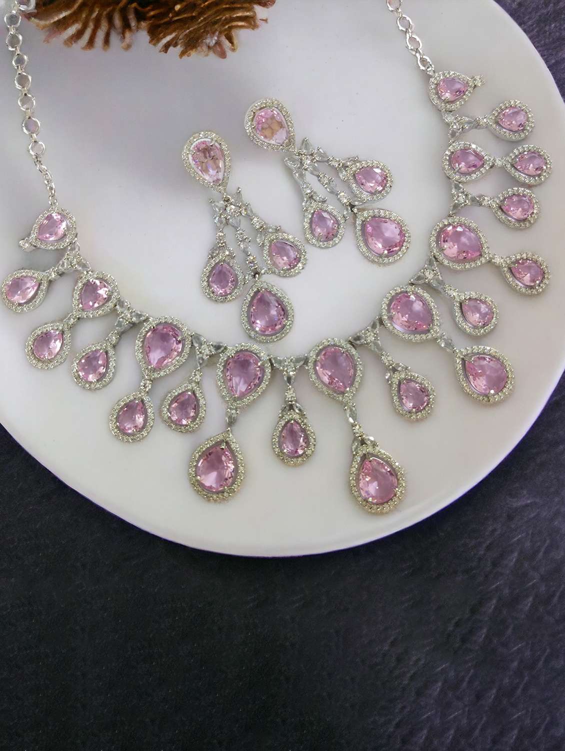 women stone studded necklace and earring set