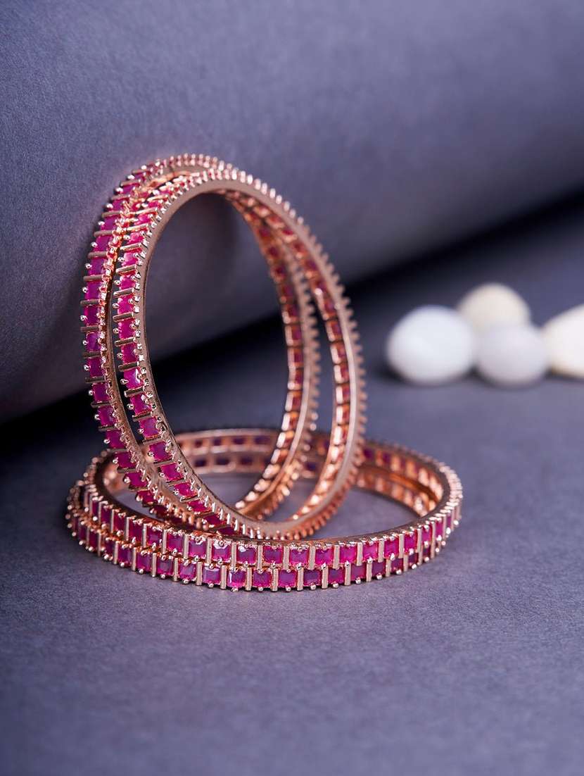 women purple brass bangles