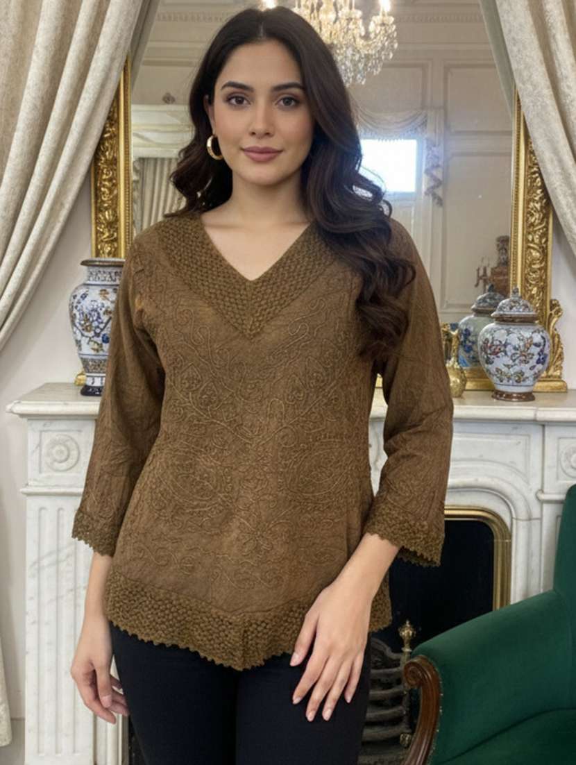 women embroidered three quarter sleeve short kurti