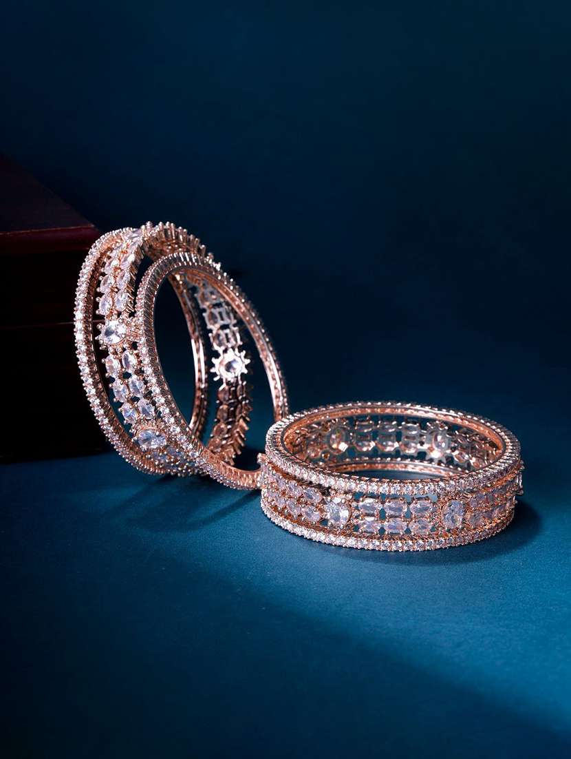 women stone studded brass bangle