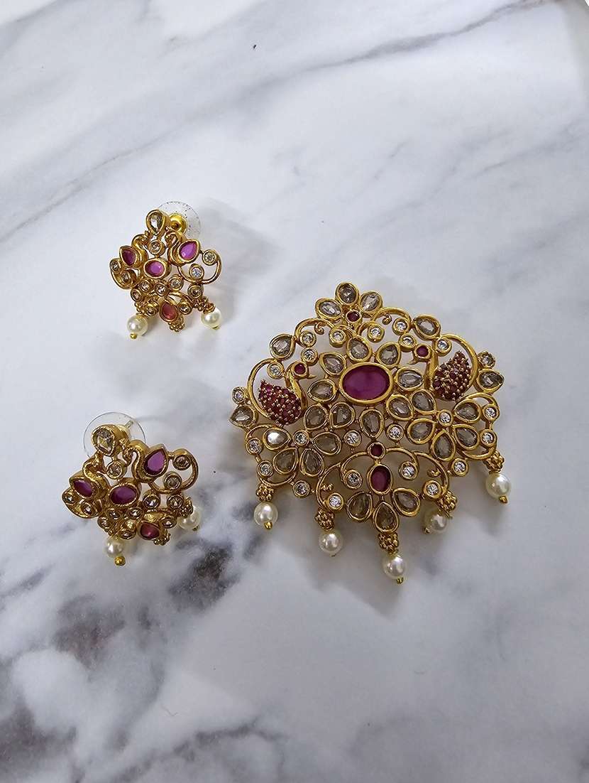 women stone studded pendent locket and earring set