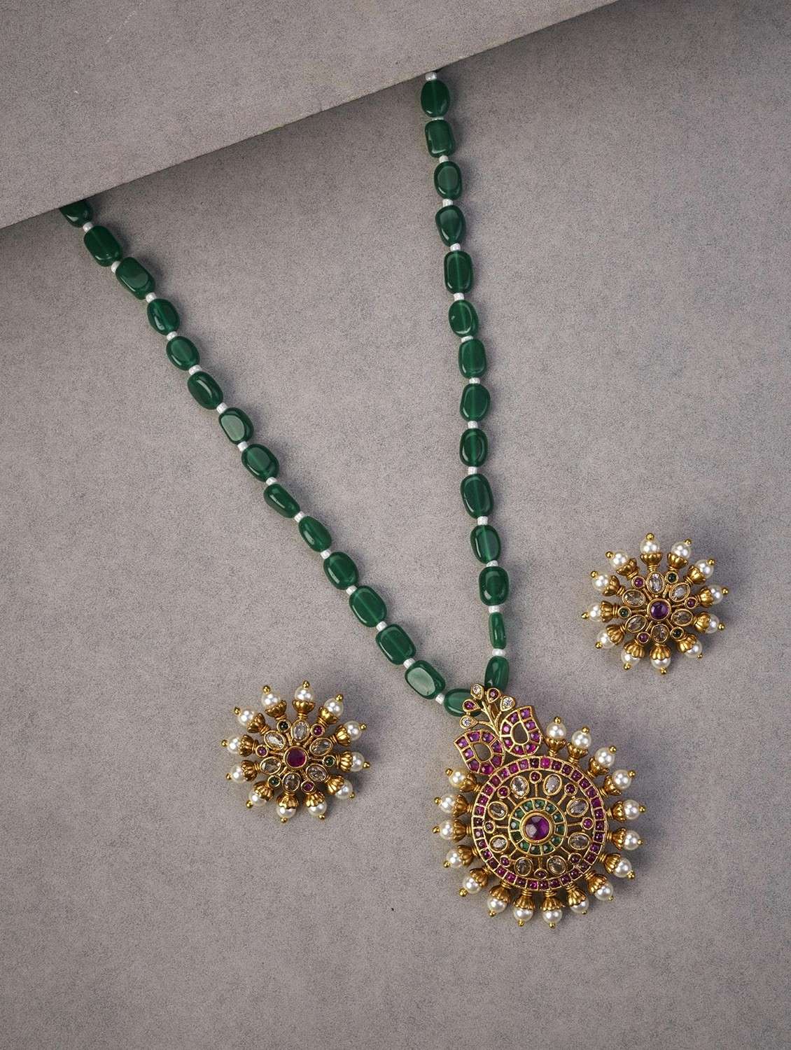 women gold plated pendent set with earring