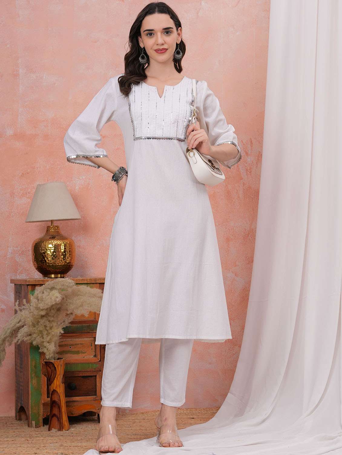 women solid with work three quarter sleeve a-line kurta
