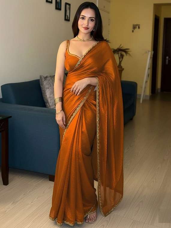 women solid with embellished bordered saree with blouse