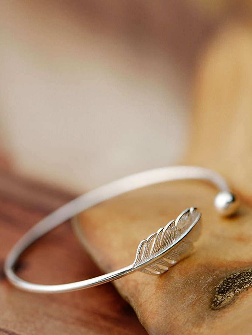 women silver feather design bracelet