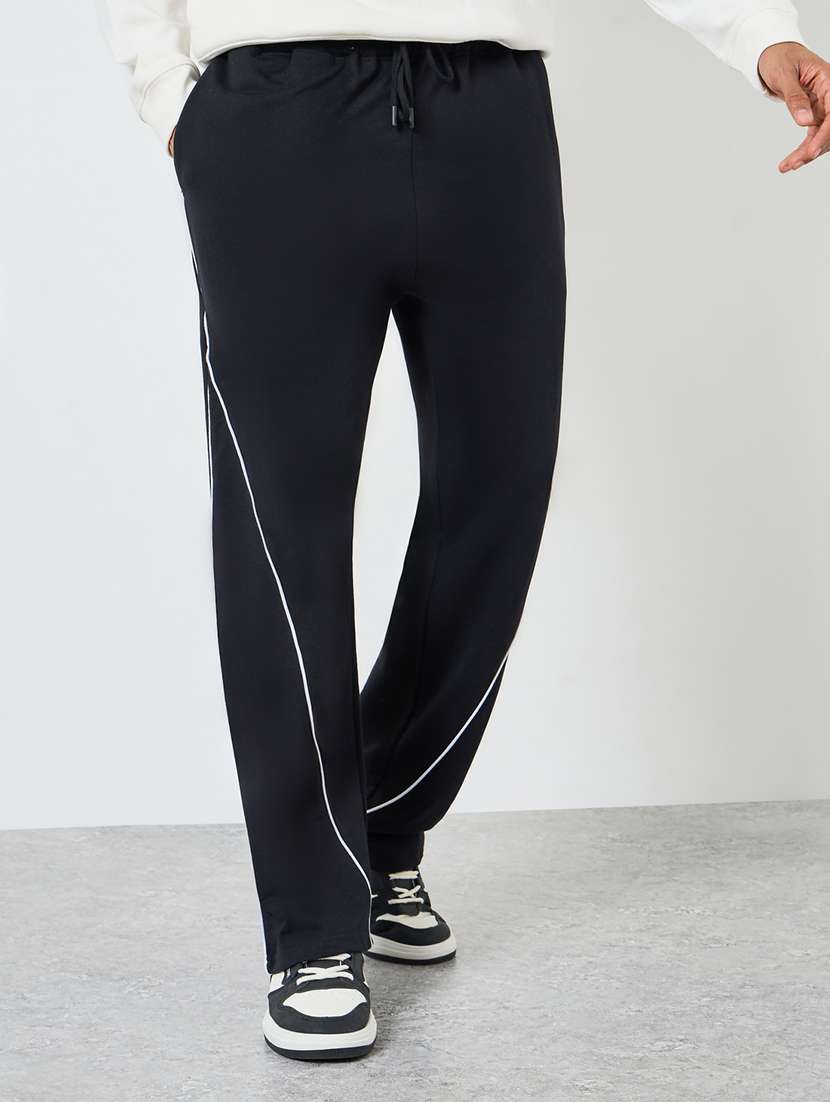 men solid mid rise relaxed fit track pant