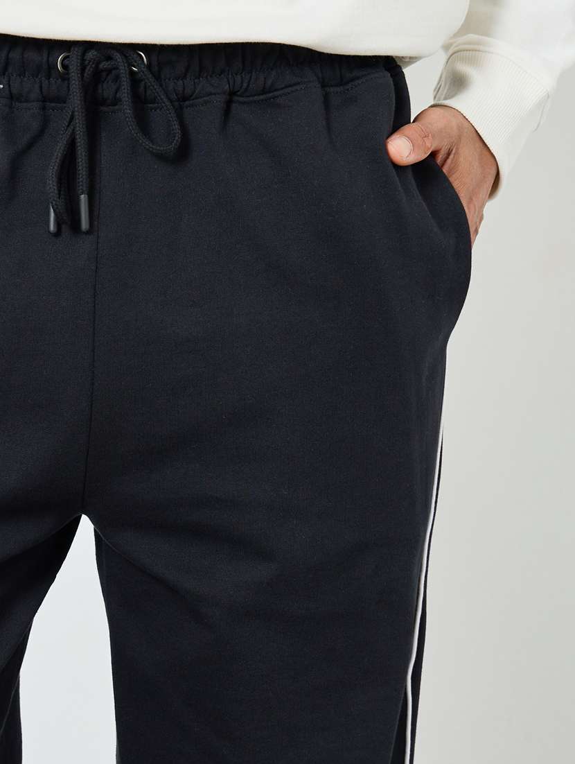 men solid mid rise relaxed fit track pant - 22287903 -  Standard Image - 3