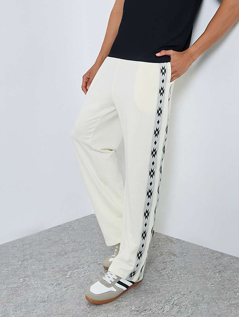 men solid mid rise relaxed fit track pant