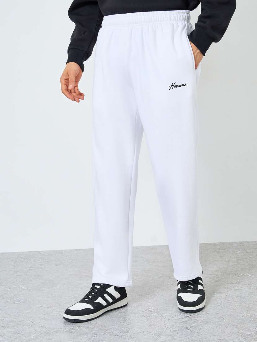 men solid mid rise relaxed fit track pant