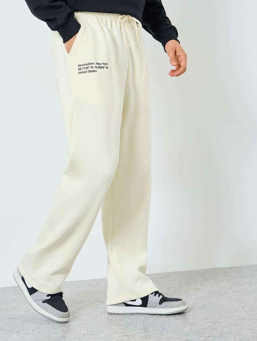 men solid mid rise relaxed fit track pant
