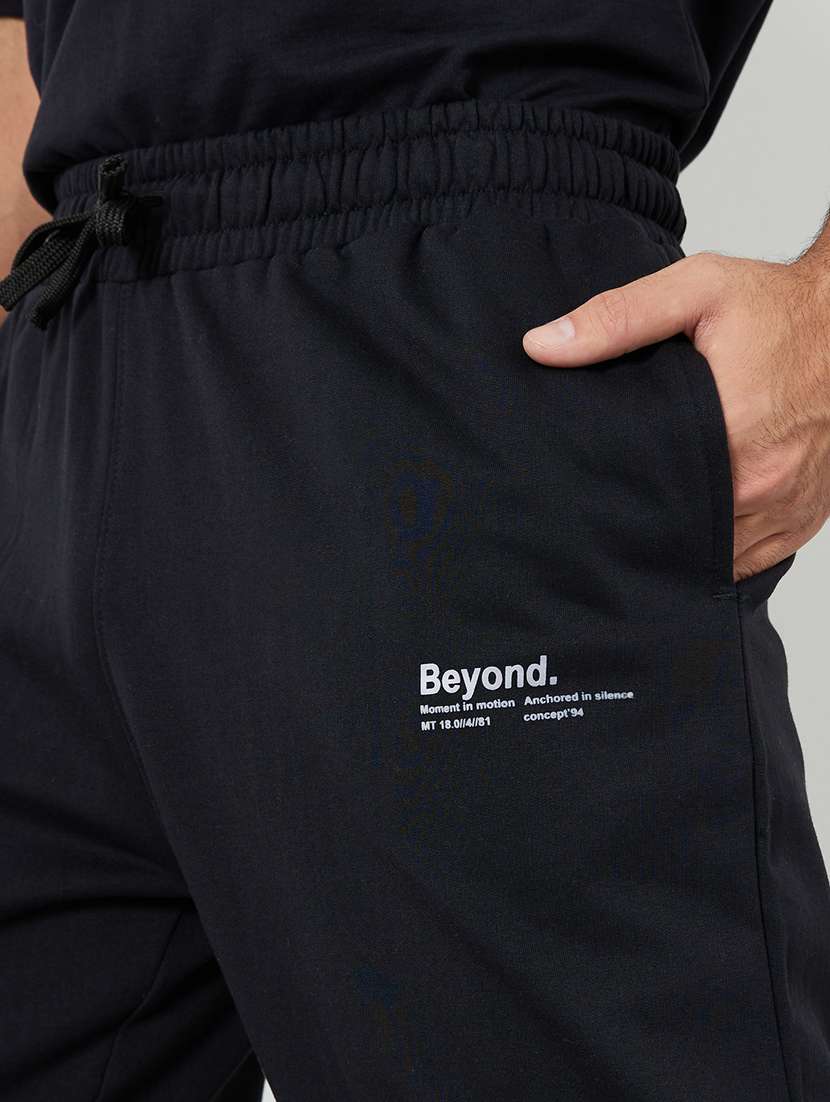 men solid mid rise relaxed fit track pant - 22287960 -  Standard Image - 3