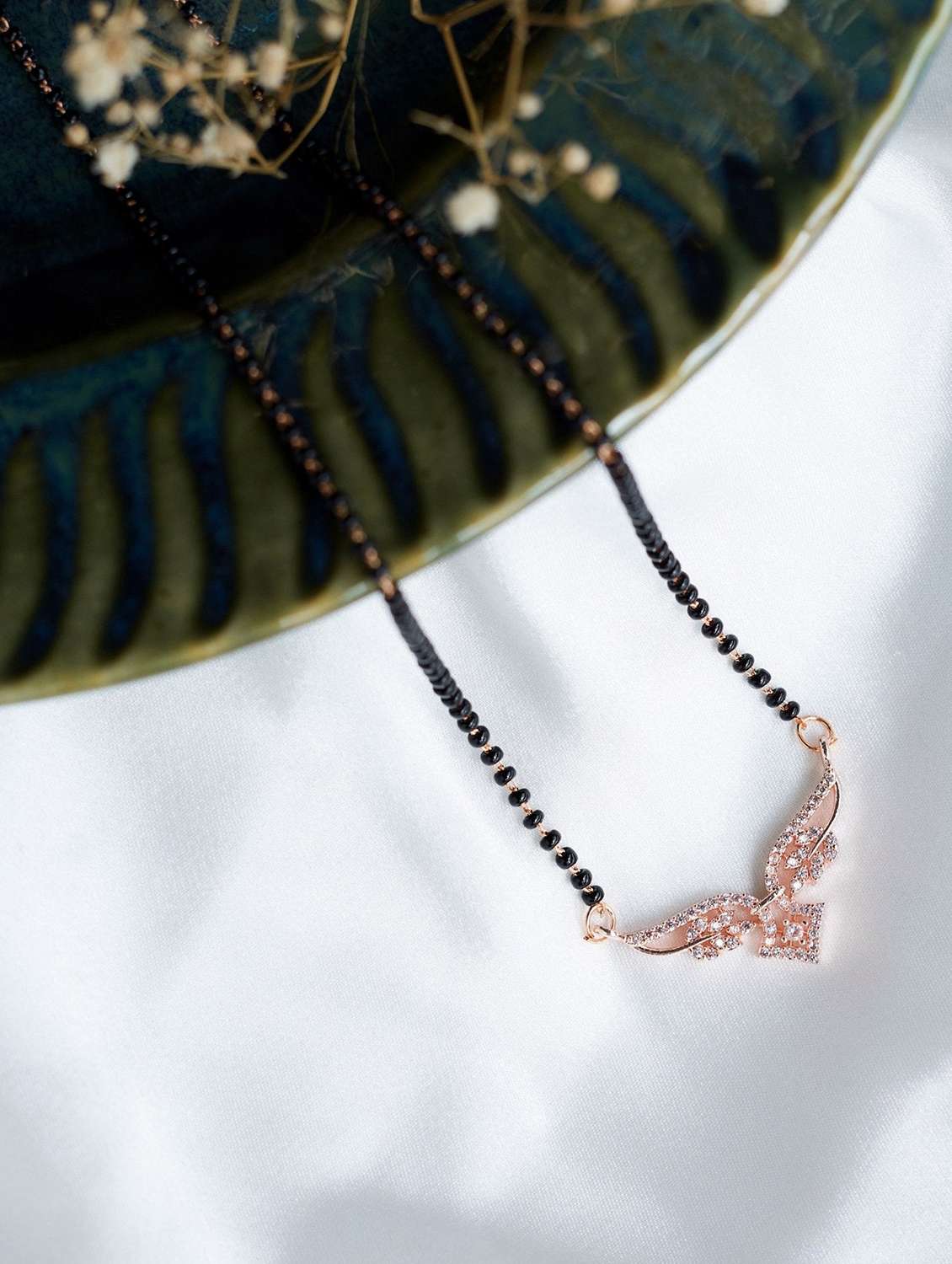 women artificial stones studded and beaded mangalsutra