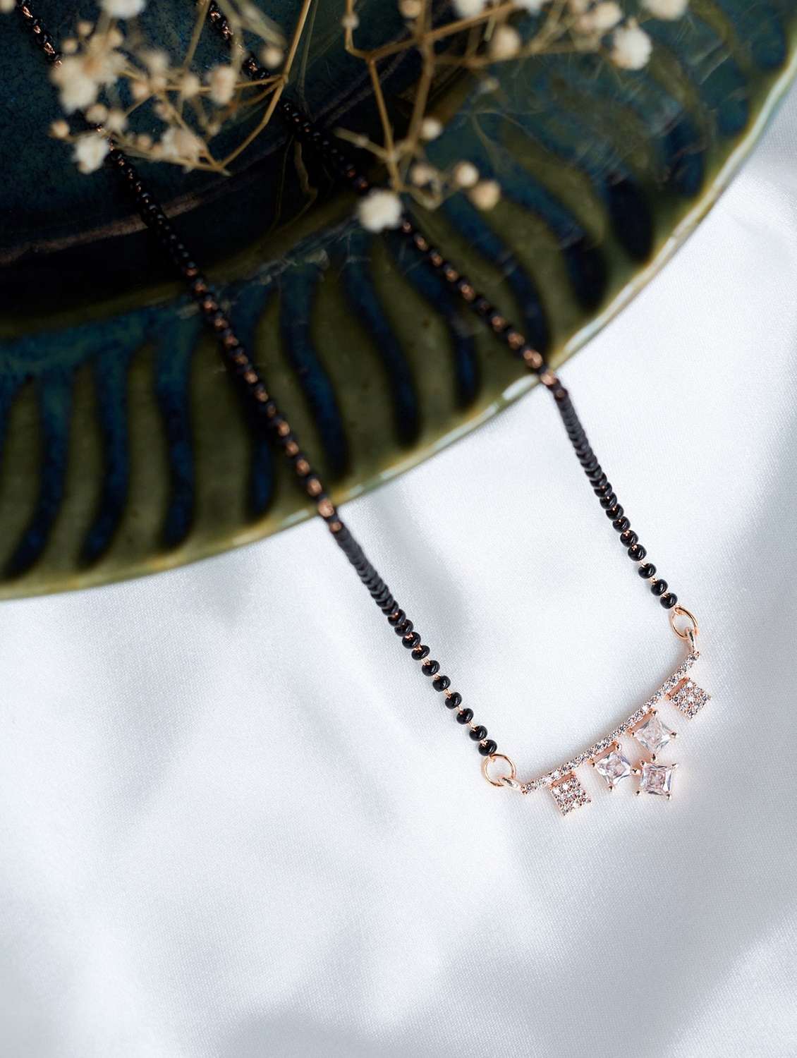 women artificial stones studded and beaded mangalsutra