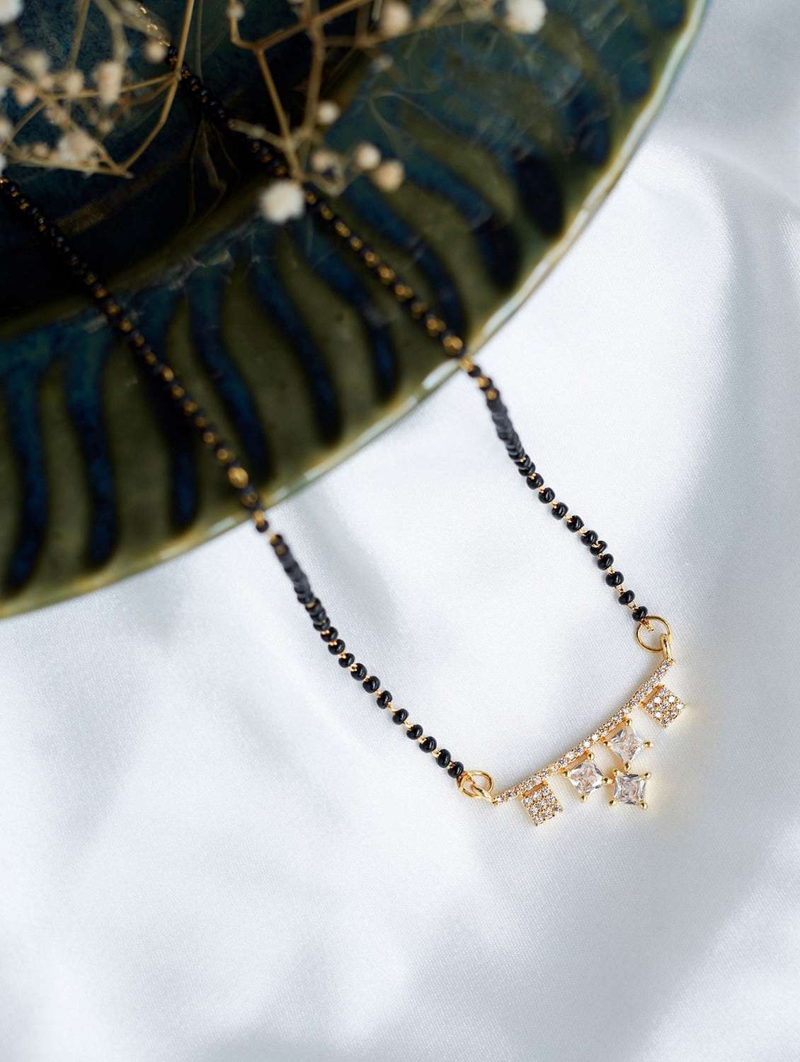 women artificial stones studded and beaded mangalsutra