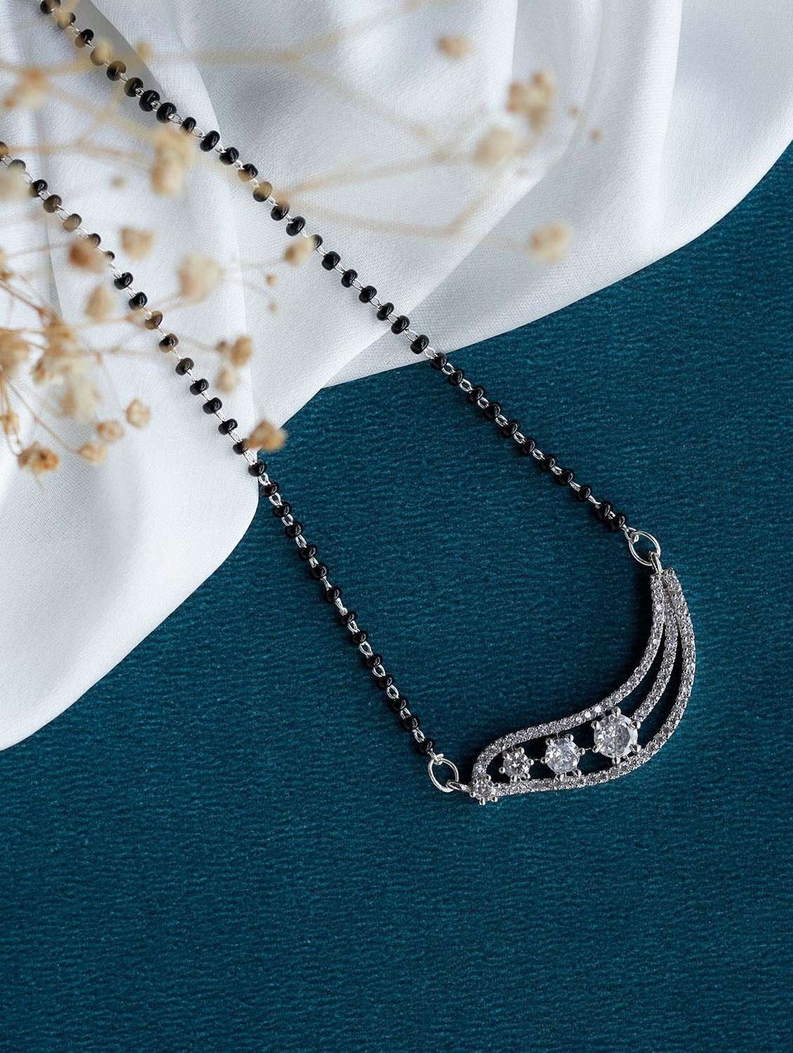 women artificial stones studded and beaded mangalsutra