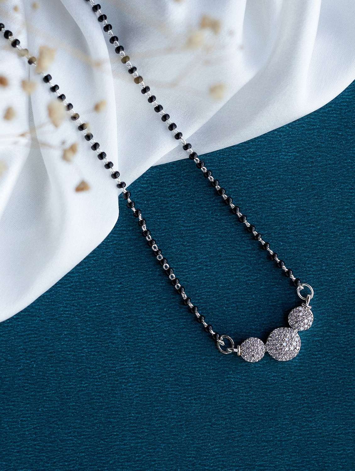 women artificial stones studded and beaded mangalsutra