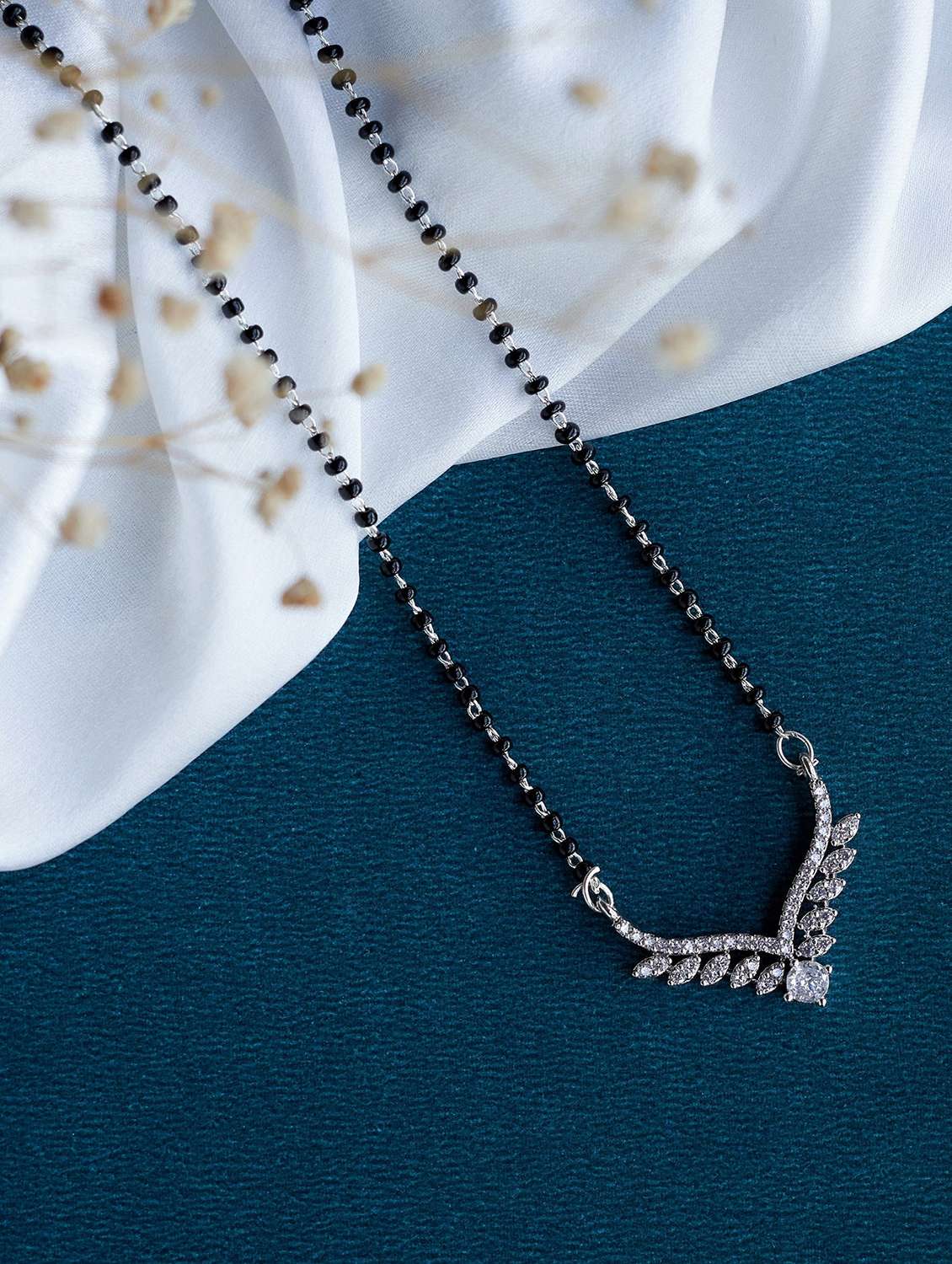 women artificial stones studded and beaded mangalsutra