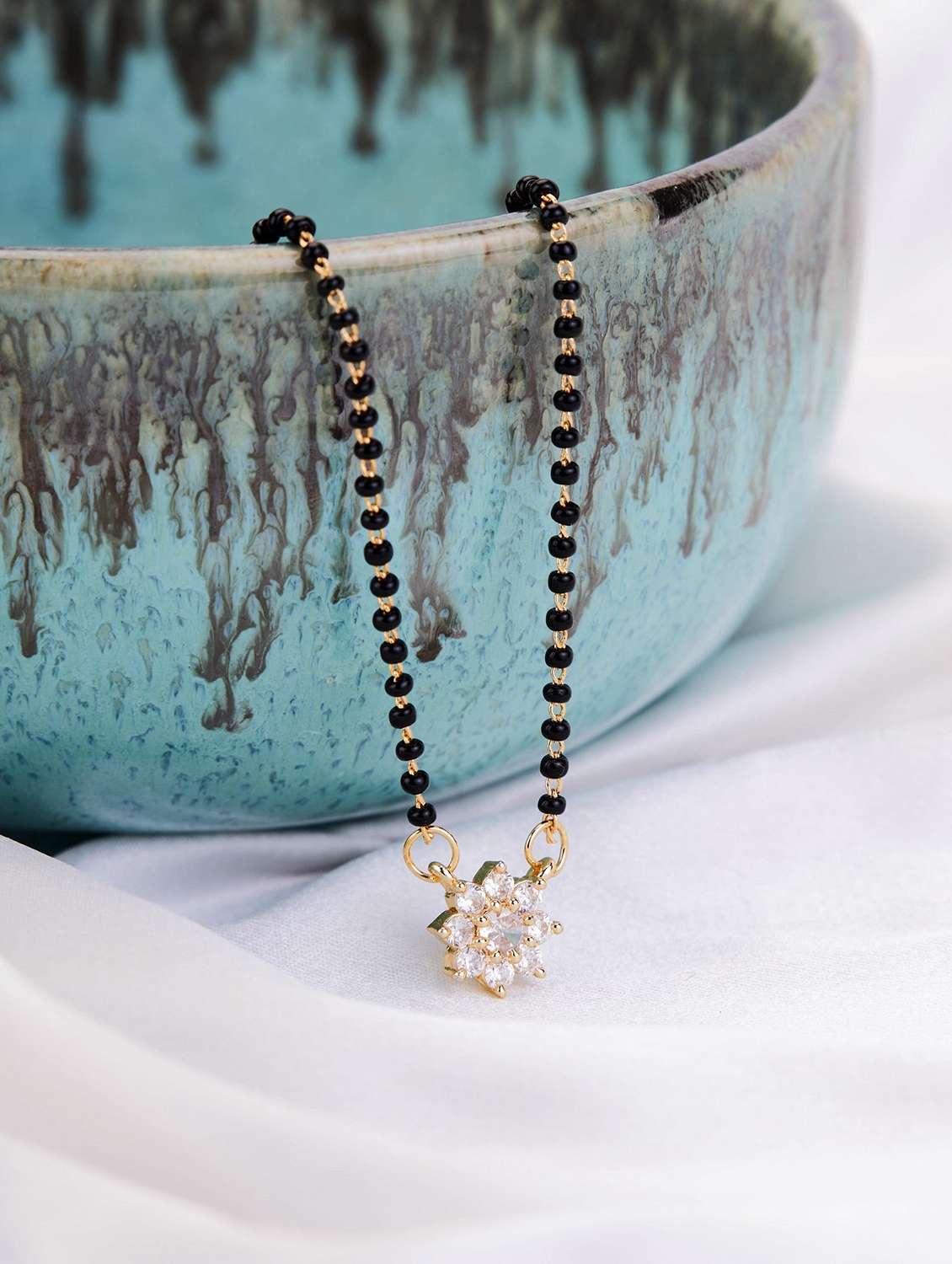 women artificial stones studded and beaded mangalsutra