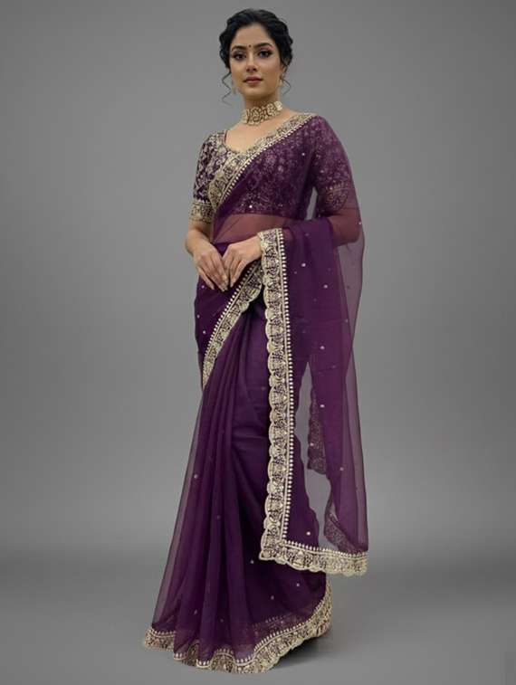 women solid with work embroidered saree with blouse