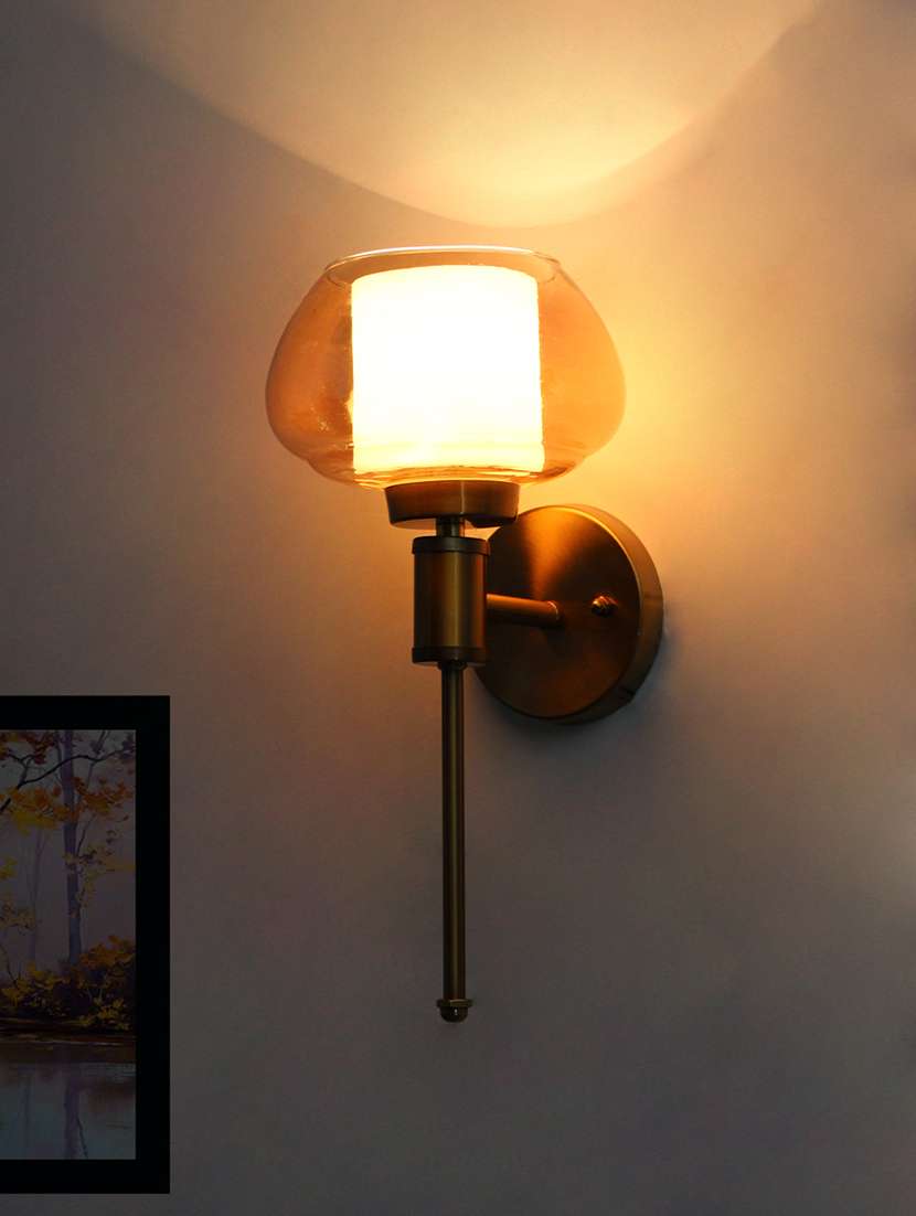 brass wall sconce wall light fixture with amber glass shade