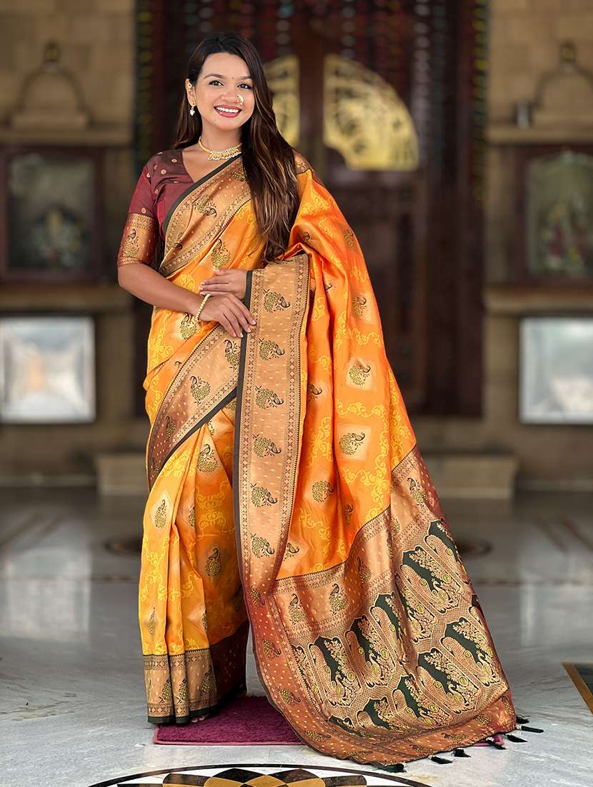women self design banarasi saree with blouse