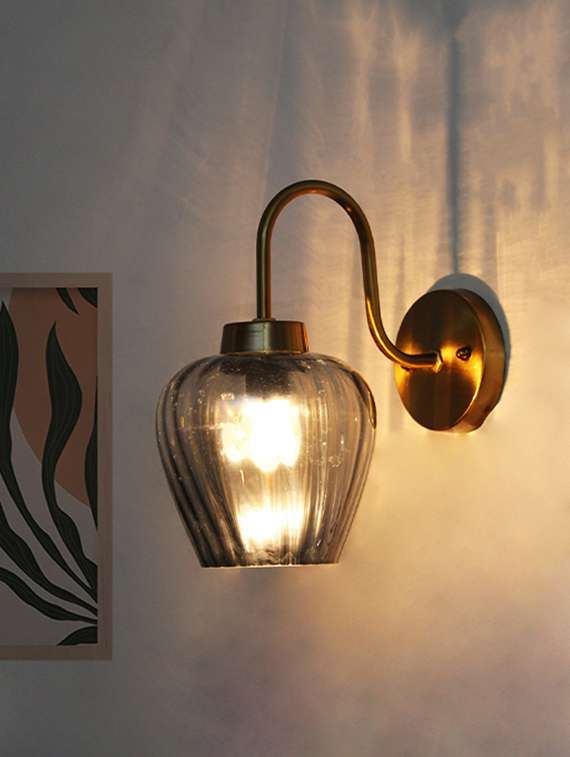elegant smokey grey glass wall light with curved holder