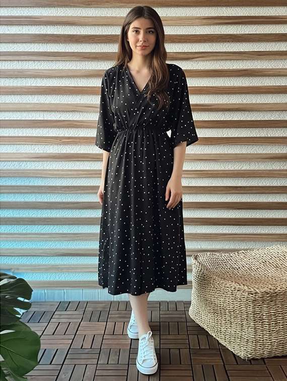 women polka doted fit and flared dress