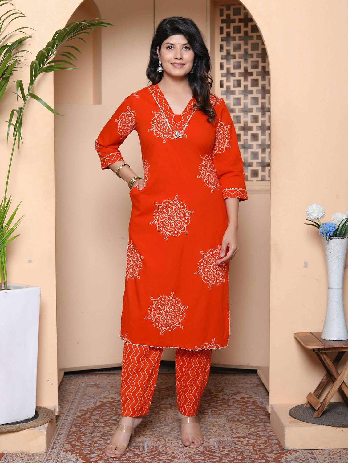 women bandhani printed three quarter sleeve kurta pant set