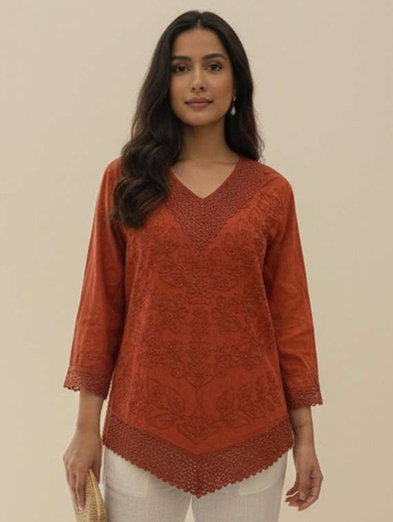 women embroidered three quarter sleeve kurti