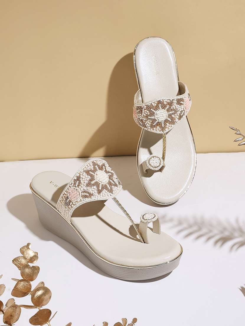 women embellished one toe wedges