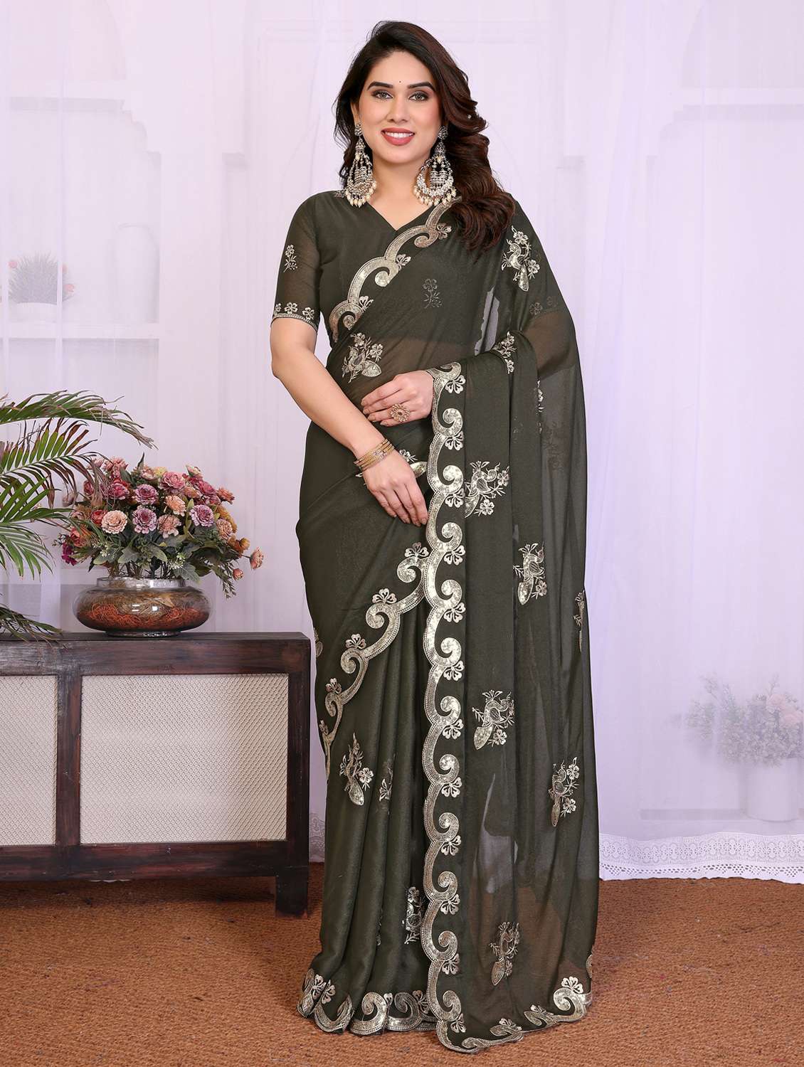 women solid with work embroidered saree with blouse