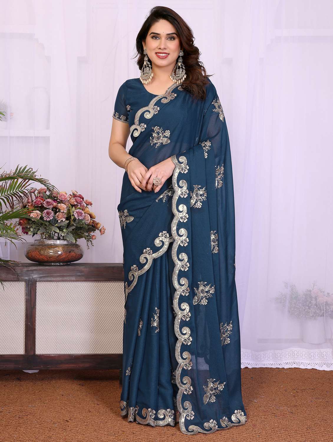 women solid with work embroidered saree with blouse