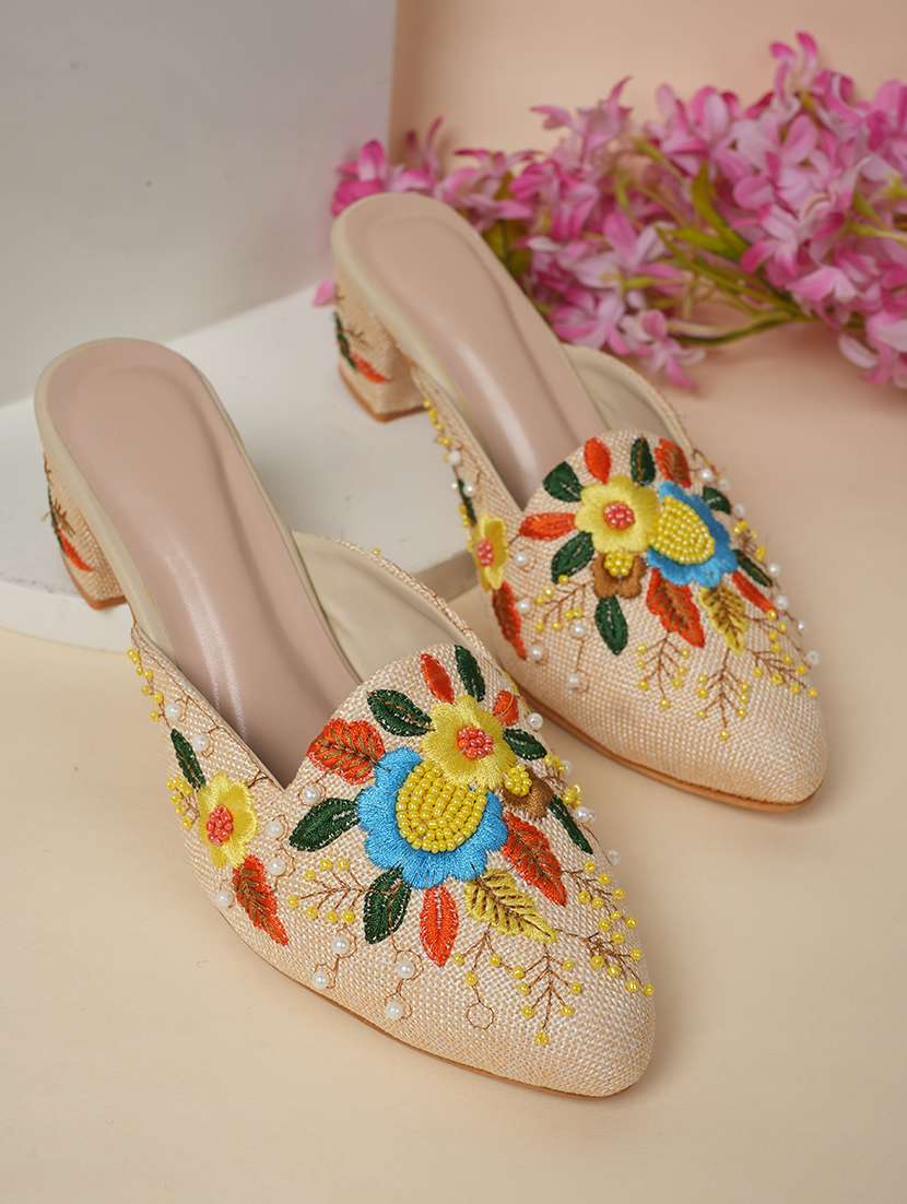 women embellished slip on mules