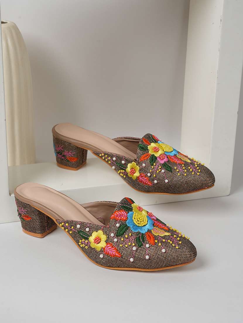 women embellished slip on mules