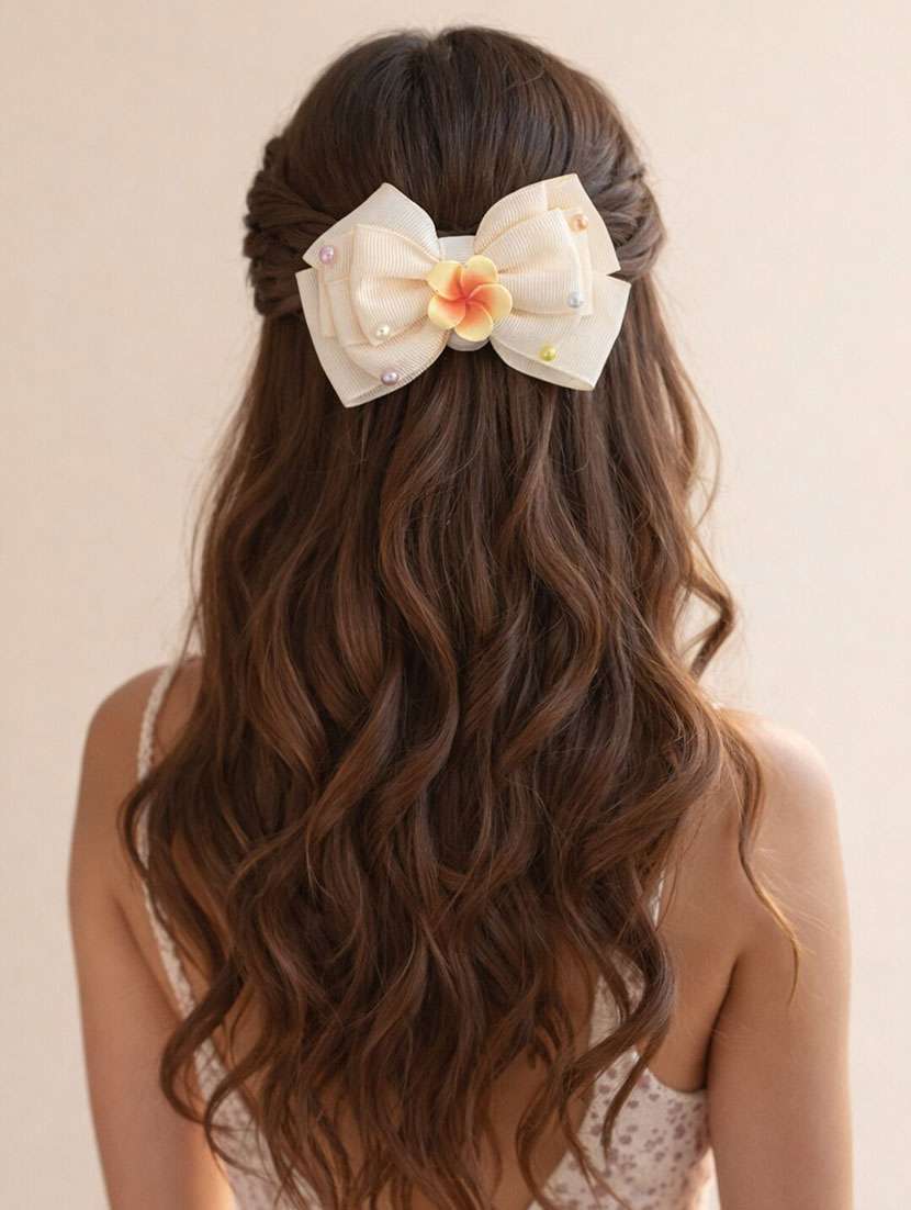 cream bow hair clip with floral center & pearls