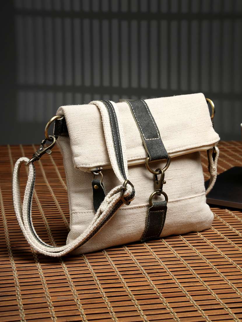 women solid sling bag with adjustable strap