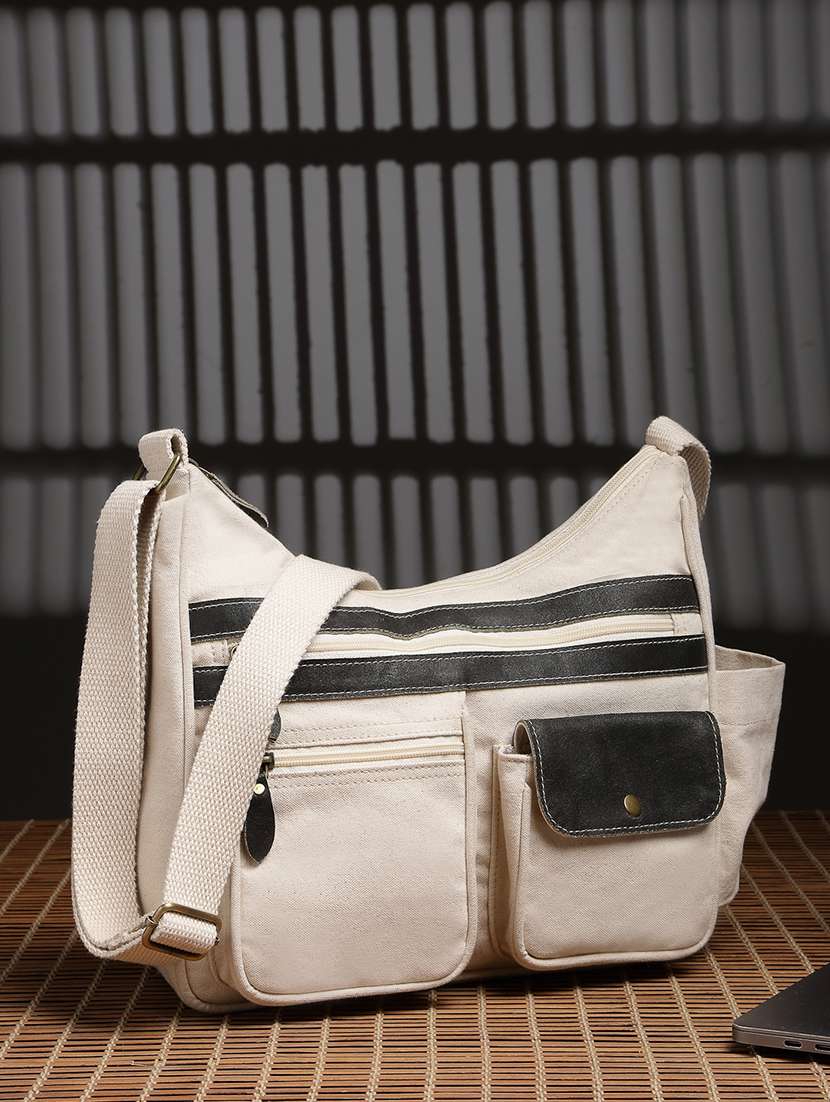 women solid sling bag with adjustable strap