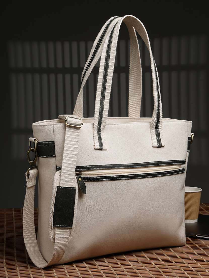 women cream solid dual handles tote bag