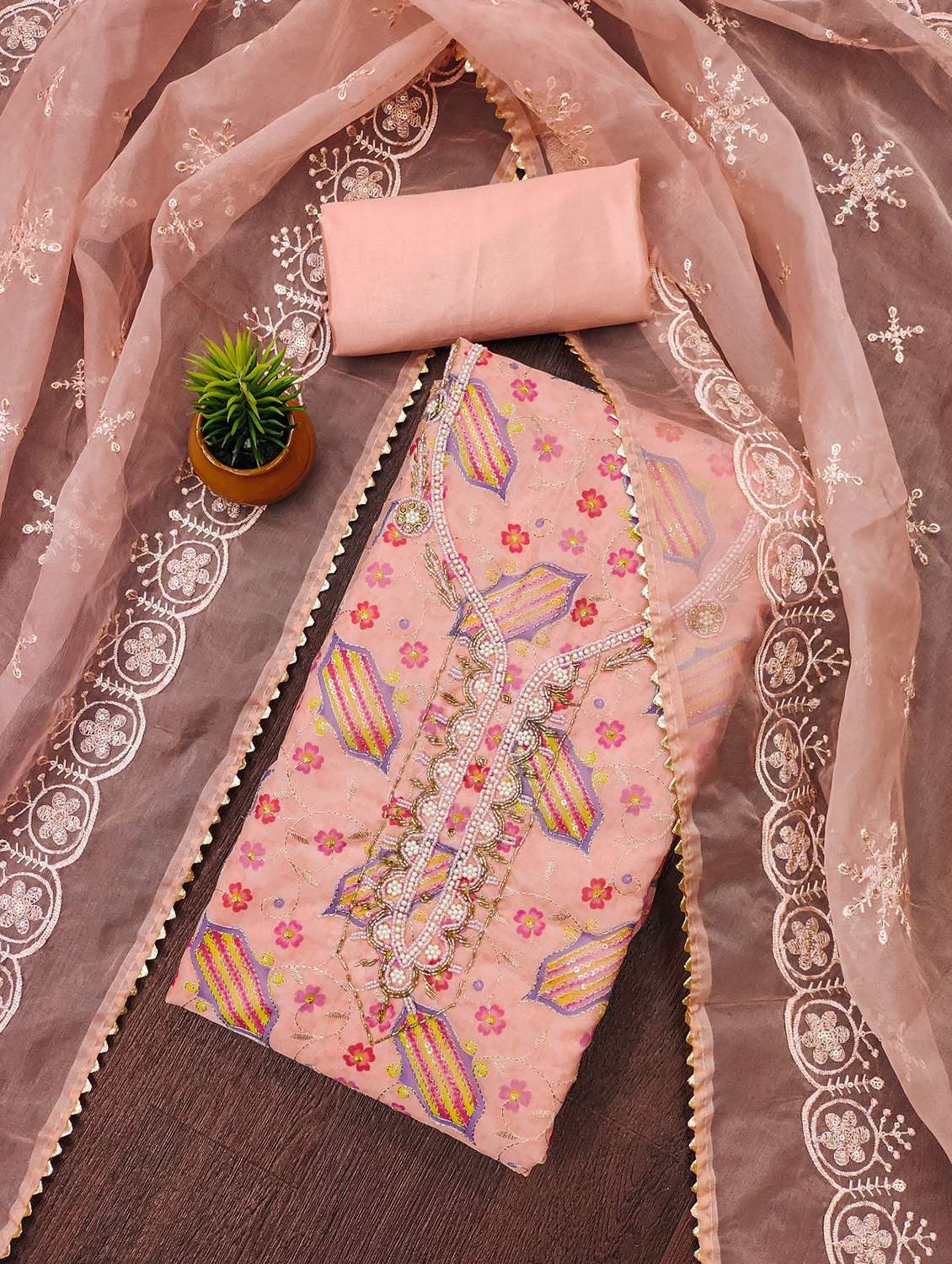 women solid with work unstitched suit set