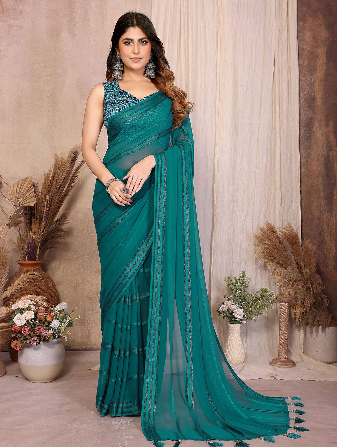women striped embellished  saree with blouse